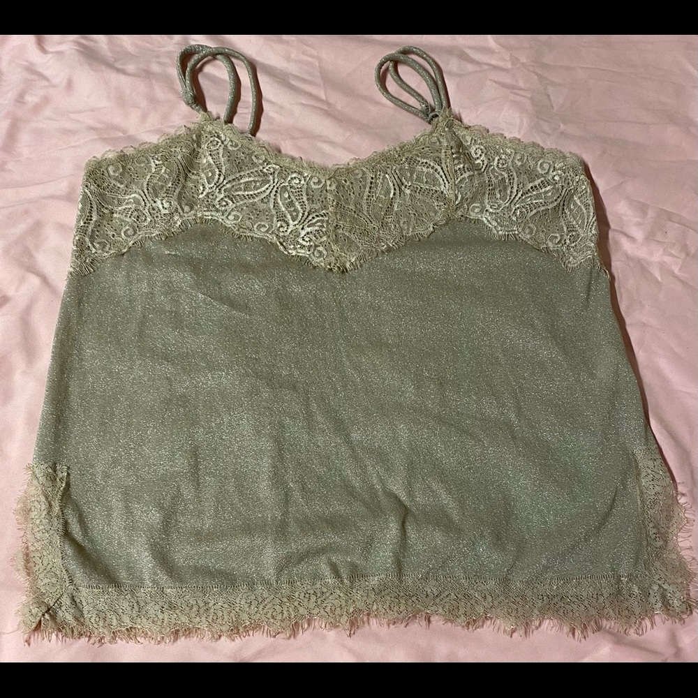 tank top made of shiny golden fabric